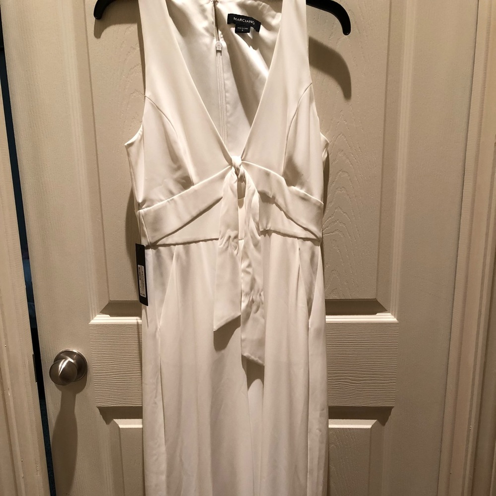 White jumpsuit/ romper